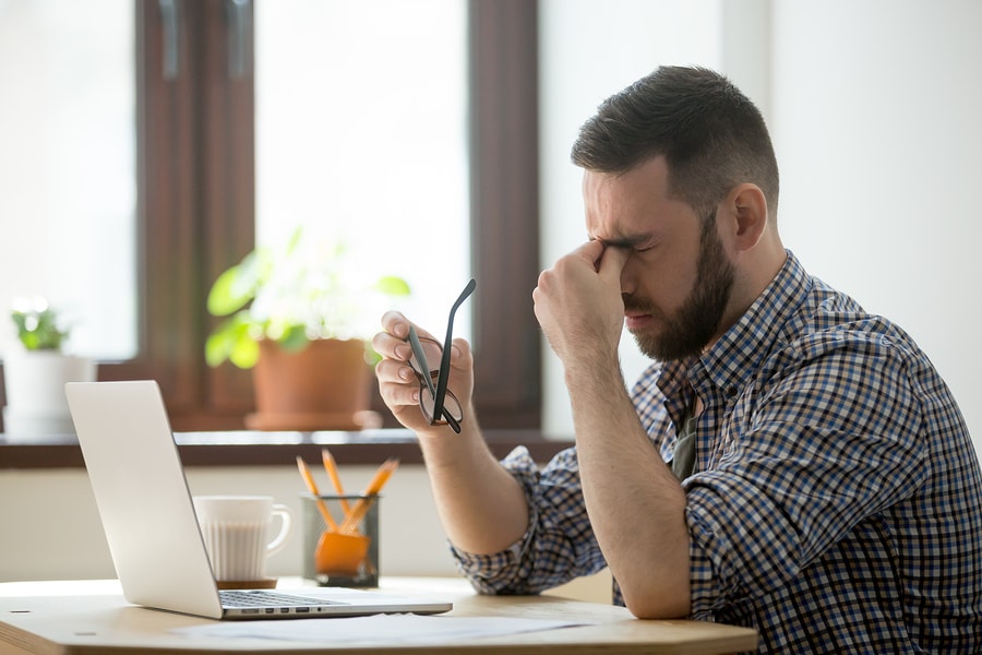 Stress from ads and their malware stressed man